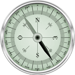 Metal framed green compass face