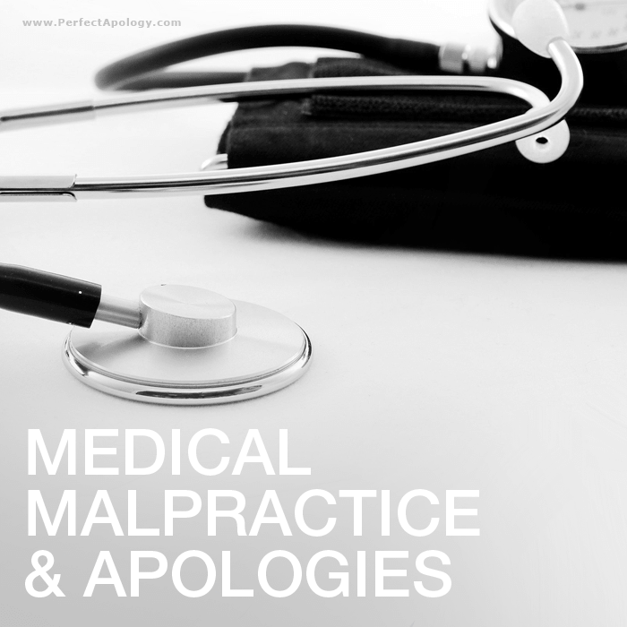 Medical Malpractice and Apologies Stethoscope lying on a desk