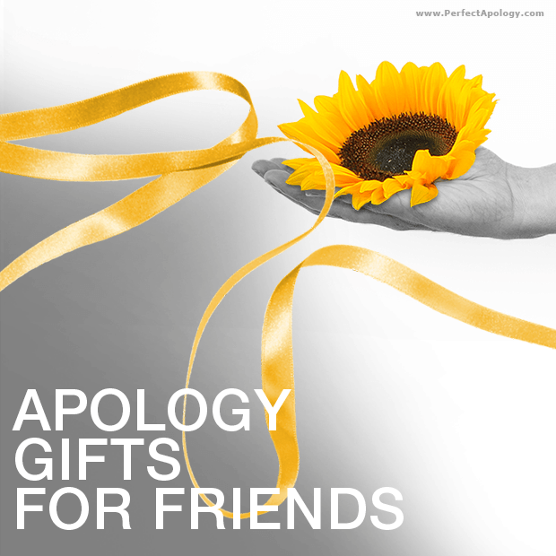 Apology Gifts For Friends A hand extended with a sunflower resting in the palm with a free flowing golden yellow ribbon